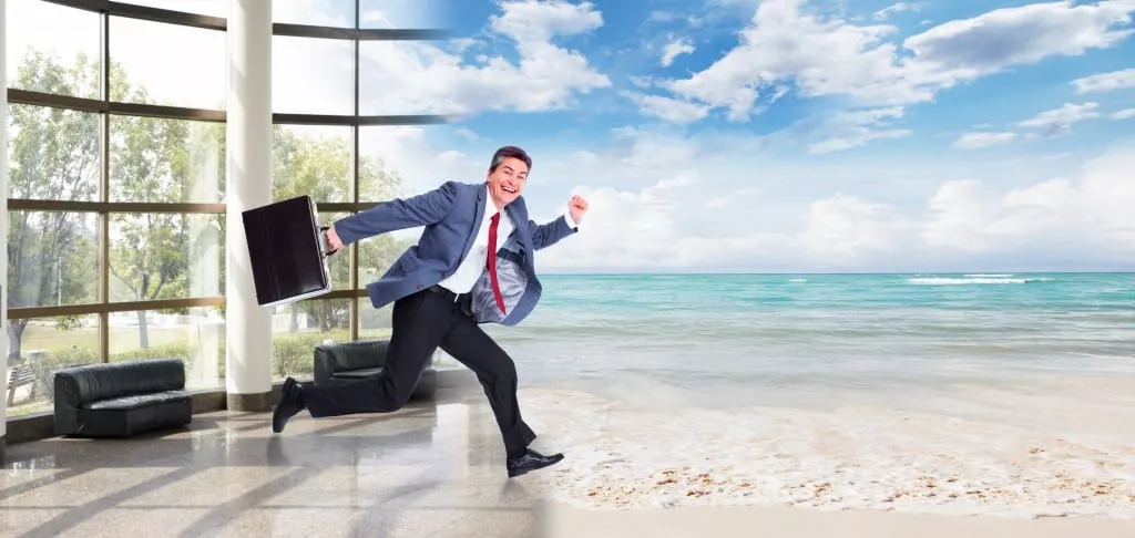 Happy Man running on the beach.